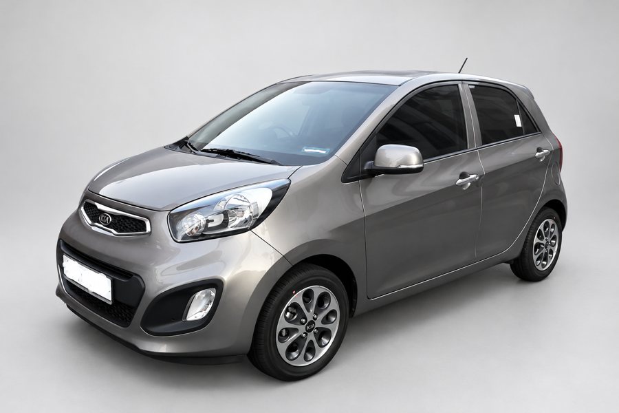 The same grey hatchback on a plain studio backdrop after an edit by the Crews picture tool.